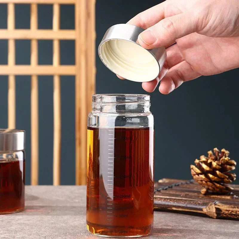 CONS25 - Bottiglia di vetro da 100-500 ml con scala